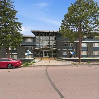 Riverbend Apartments building front view on Carmel Drive