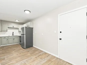 Kitchen with stainless appliances at Riverbend Apartments
